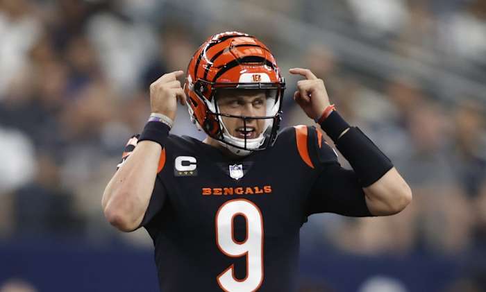 Sep 18, 2022; Arlington, Texas, USA; Cincinnati Bengals quarterback Joe Burrow (9) calls a play in the first quarter against the Dallas Cowboys at AT&T Stadium. Mandatory Credit: Tim Heitman-USA TODAY Sports