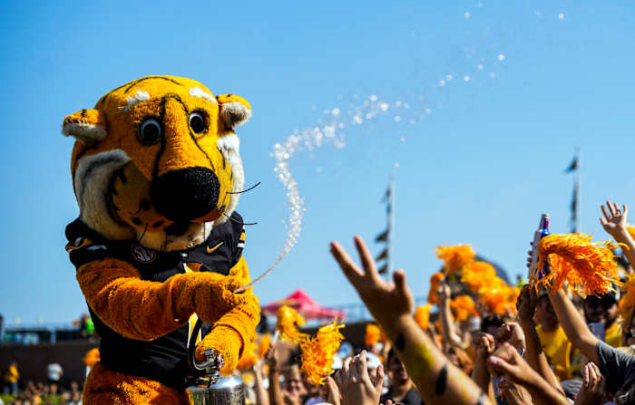 Sep 17, 2022; Columbia, Missouri, USA; Missouri Tigers mascot Truman the Tiger sprays water on the student section prior to a game against the Abilene Christian Wildcats at Faurot Field at Memorial Stadium. Mandatory Credit: Jay Biggerstaff-USA TODAY Sports
