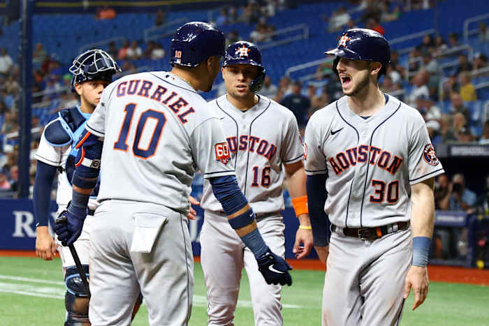 Houston right fielder Kyle Tucker (30) is congratulated by first baseman Yuli Gurriel (10) after hitting a two-run home run against Tampa Bay. (Nathan Ray Seebeck-USA TODAY Sports)