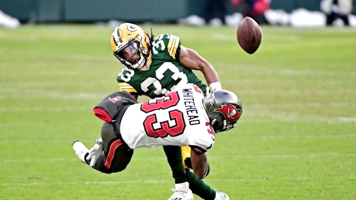 Then-Buccaneers safety Jordan Whitehead forced a fumble by Packers running back Aaron Jones to start the second half of the 2020 NFC Championship Game. (Photo by Benny Sieu/USA Today Sports)