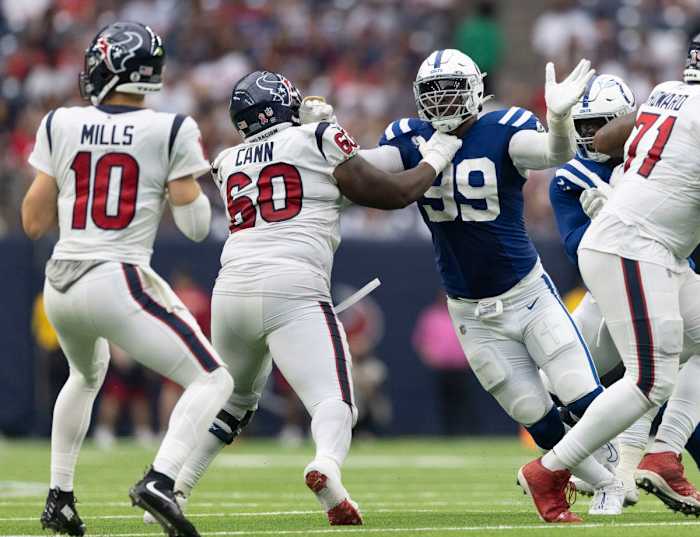 Sep 11, 2022; Houston, Texas, USA; Indianapolis Colts defensive tackle DeForest Buckner (99) rushes against Houston Texans guard A.J. Cann (60) in the fourth quarter at NRG Stadium. Mandatory Credit: Thomas Shea-USA TODAY Sports