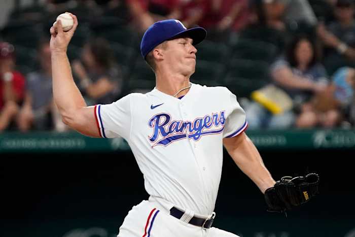 Sep 24, 2022; Arlington, Texas, USA; Texas Rangers starting pitcher Glenn Otto (49) throws to the plate during the first inning against the Cleveland Guardians at Globe Life Field. Mandatory Credit: Raymond Carlin III-USA TODAY Sports