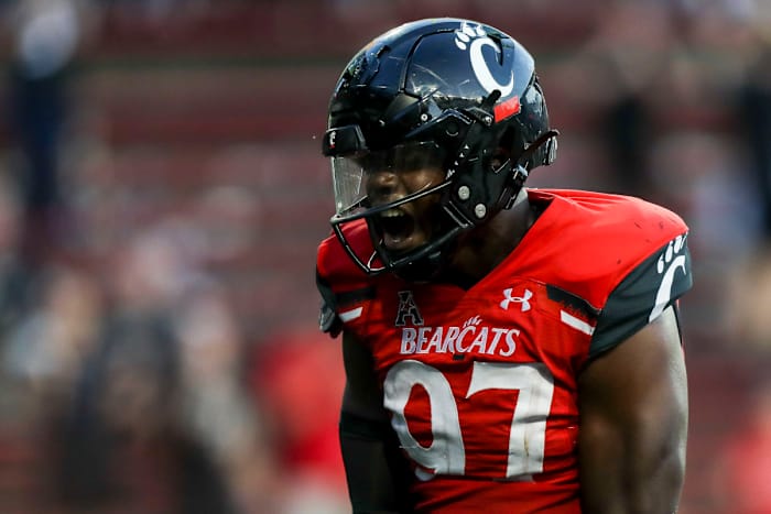 Sep 24, 2022; Cincinnati, Ohio, USA; Cincinnati Bearcats defensive lineman Eric Phillips (97) reacts after sacking Indiana Hoosiers quarterback Connor Bazelak (not pictured) in the second half at Nippert Stadium. Mandatory Credit: Katie Stratman-USA TODAY Sports