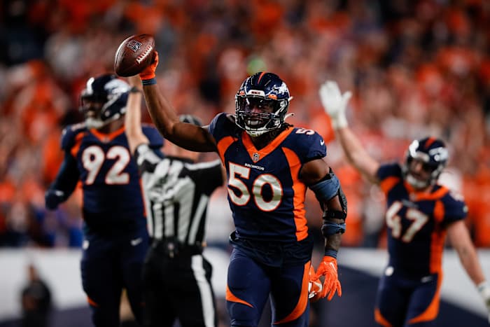 Denver Broncos linebacker Jonas Griffith (50) celebrates after an interception in the fourth quarter against the San Francisco 49ers at Empower Field at Mile High.