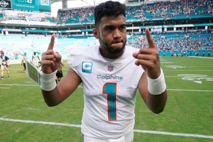 Miami Dolphins quarterback Tua Tagovailoa (1) gestures at the end of an NFL football game against the Buffalo Bills, Sunday, Sept. 25, 2022, in Miami Gardens, Fla. The Dolphins defeated the Bills 21-19.