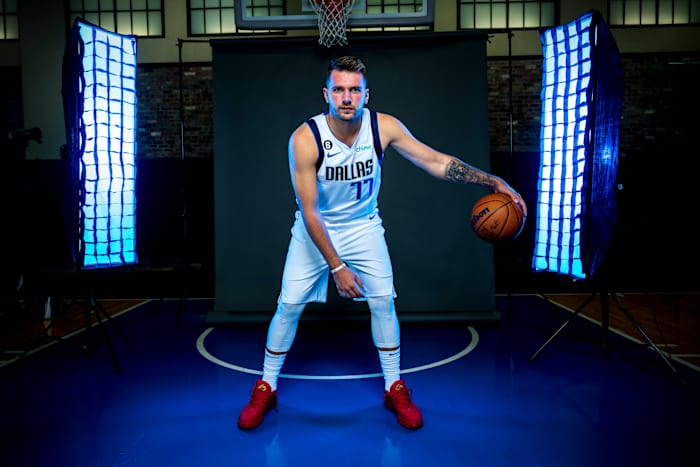 Luka Doncic poses for a photo during media day.