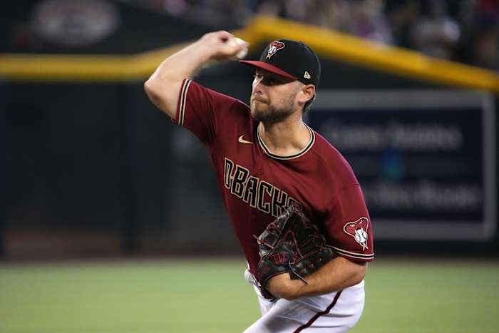 Jul 24, 2022; Phoenix, Arizona, USA; Arizona Diamondbacks starting pitcher Corbin Martin (25) pitches against the Washington Nationals during the first inning at Chase Field. Mandatory Credit: Joe Camporeale-USA TODAY Sports