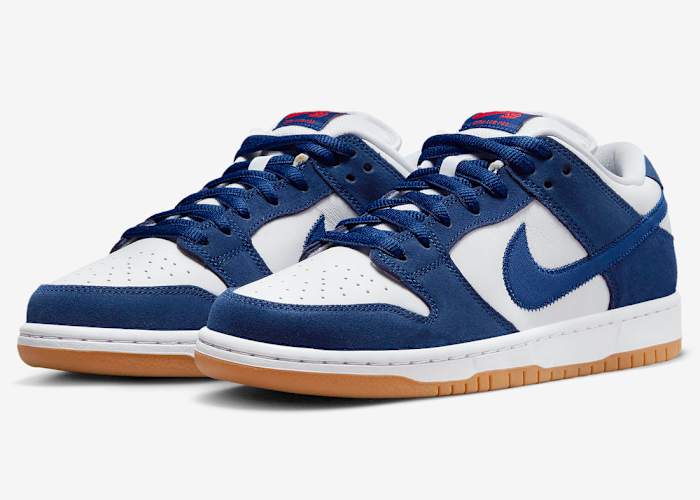 View of blue and white Nike Dunk Low shoes.