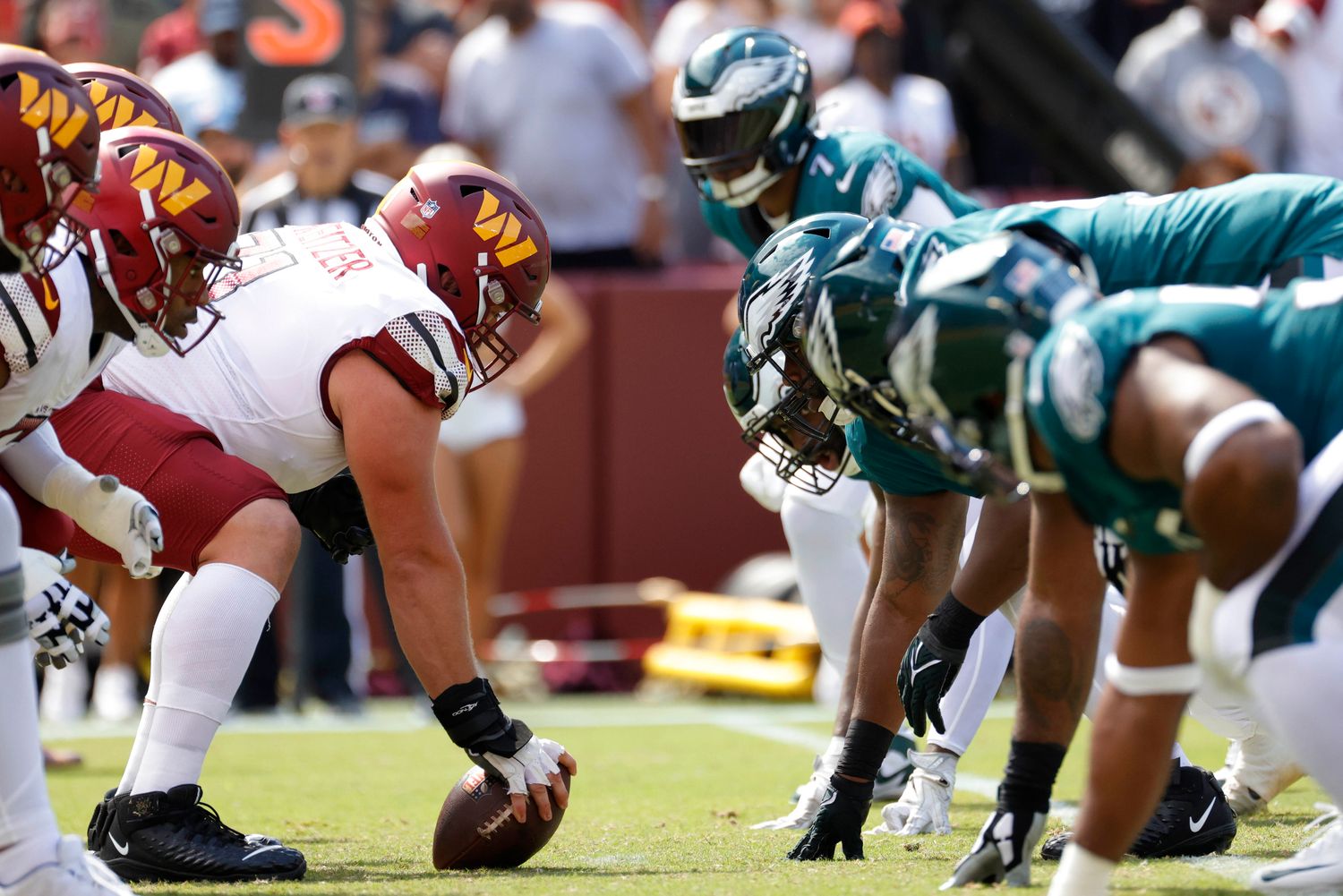 The Washington Commanders offense lines up against the Philadelphia Eagles defense during the first quarter at FedExField. Mandatory Credit: Geoff Burke-USA TODAY Sports