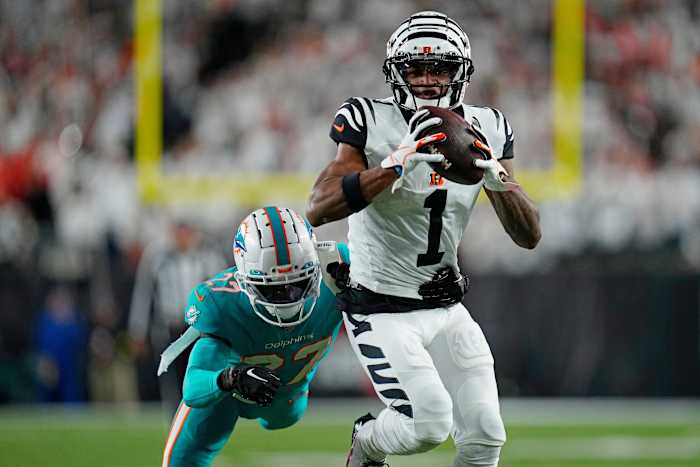 Cincinnati Bengals wide receiver Ja'Marr Chase (1) catches a deep pass over Miami Dolphins cornerback Keion Crossen (27) in the fourth quarter of the NFL Week 4 game between the Cincinnati Bengals and the Miami Dolphins at PayCor Stadium in downtown on Thursday, Sept. 29, 2022. The Bengals improved to 2-2 with a 27-15 win over the Dolphins. Miami Dolphins At Cincinnati Bengals Week 4