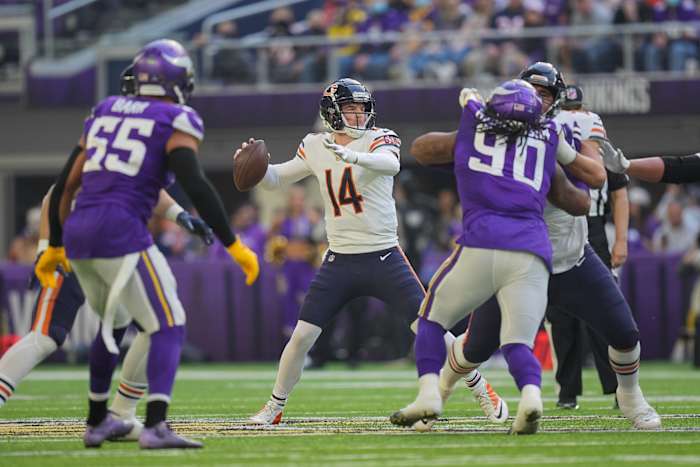 Jan 9, 2022; Chicago Bears quarterback Andy Dalton (14) passes against the Minnesota Vikings at U.S. Bank Stadium. Mandatory Credit: Brad Rempel-USA TODAY Sports