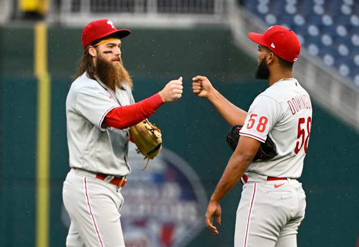 Brandon Marsh celebrates with Seranthony Dominguez.
