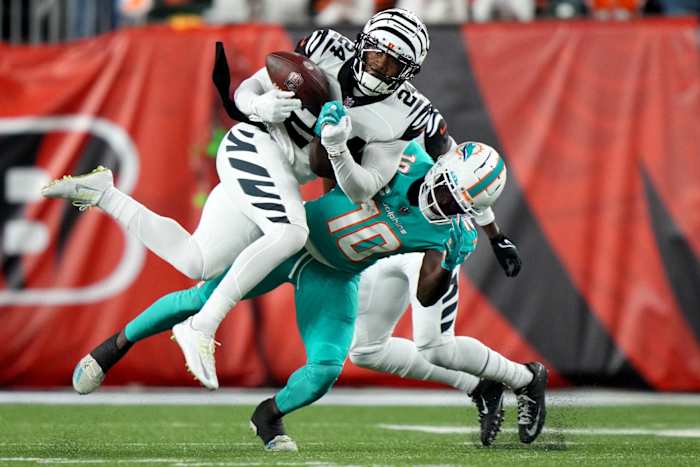 Sep 29, 2022; Cincinnati, Ohio, USA; Cincinnati Bengals safety Vonn Bell (24) intercepts a pass intended for Miami Dolphins wide receiver Tyreek Hill (10) in the first quarter at Paycor Stadium in Cincinnati. Mandatory Credit: Kareem Elgazzar-USA TODAY Sports