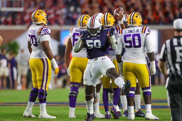 Auburn Tigers defensive lineman Marcus Harris (50) celebrates his tackle for loss during the game between the LSU Tigers and the Auburn Tigers at Jordan-Hare Stadium on Oct. 1, 2022.