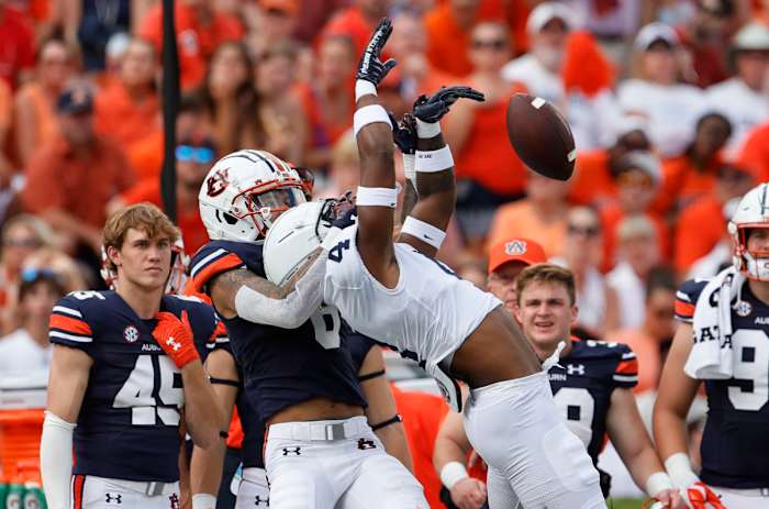 Sep 17, 2022; Auburn, Alabama, USA; Auburn Tigers wide receiver Dazalin Worsham (8) keeps Penn State Nittany Lions cornerback Kalen King (4) from the ball during the first quarter at Jordan-Hare Stadium. Mandatory Credit: John Reed-USA TODAY Sports
