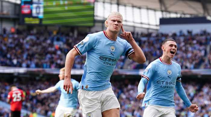 Erling Haaland celebrating a goal for Man City.