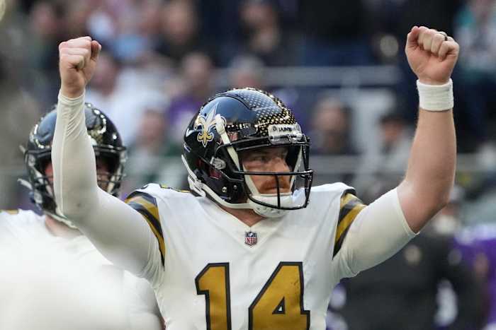 Saints QB Andy Dalton celebrates a touchdown