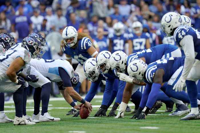 The Indianapolis Colts defensive lines up as the Tennessee Titans prepare to punt Sunday, Oct. 2, 2022, during a game against the Tennessee Titans at Lucas Oil Stadium in Indianapolis.