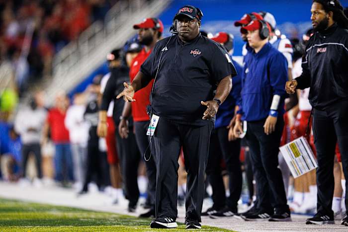 Northern Illinois head coach Thomas Hammock standing on the sidelines.