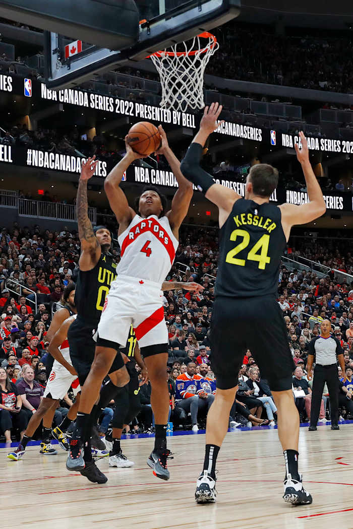 Oct 2, 2022; Edmonton, Alberta, CAN; Toronto Raptors forward Scottie Barnes (4) shoots over Utah Jazz center Walker Kessler (24) during the first quarter at Rogers Place. Mandatory Credit: Perry Nelson-USA TODAY Sports
