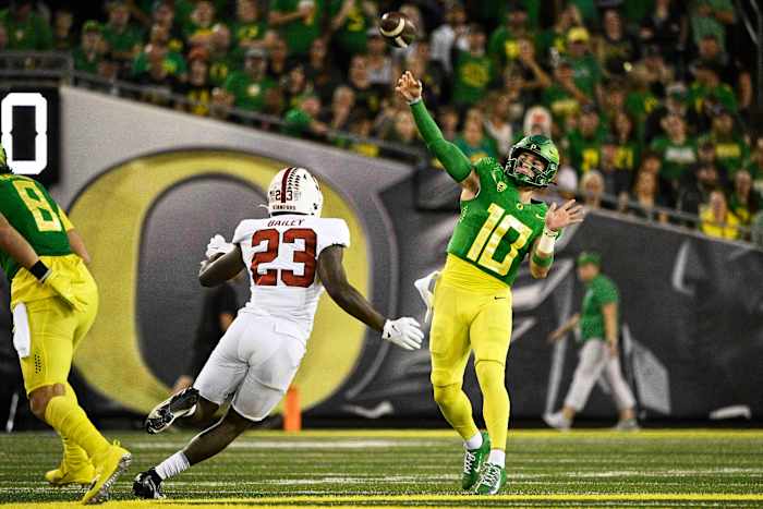 Oregon, USA; Oregon Ducks quarterback Bo Nix (10) throws a pass during the first half against Stanford Cardinal defensive end David Bailey (23) at Autzen Stadium.