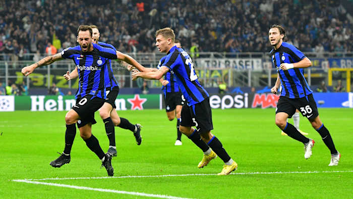 Hakan Çalhanoğlu scores for Inter Milan vs. Barcelona in the UEFA Champions League