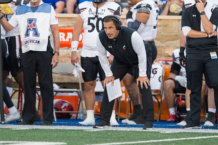 Oct 1, 2022; Tulsa, Oklahoma, USA; Cincinnati Bearcats head coach Luke Fickell looks on during the first quarter against the Tulsa Golden Hurricane at Skelly Field at H.A. Chapman Stadium. Mandatory Credit: Brett Rojo-USA TODAY Sports