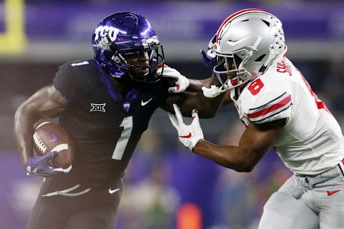 Sep 15, 2018; Arlington, TX, USA; TCU Horned Frogs wide receiver Jalen Reagor (1) is tackled by Ohio State Buckeyes cornerback Kendall Sheffield (8) in the first quarter at AT&T Stadium