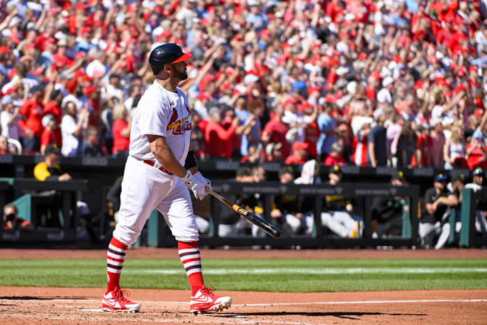 Albert Pujols watches his 702nd career home run go over the fence at Busch Stadium.