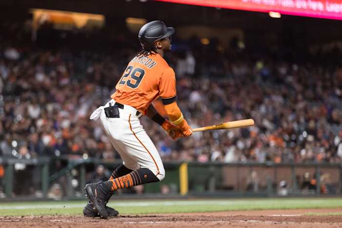 SF Giants outfielder Lewis Brinson hits a home run. (2022)
