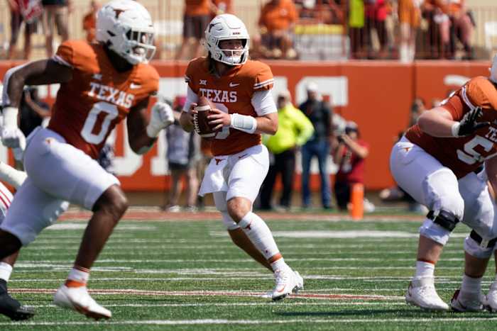 Texas Longhorns quarterback Quinn Ewers (3) looks to throw a pass against the Alabama Crimson Tide during the first half at at Darrell K Royal-Texas Memorial Stadium.