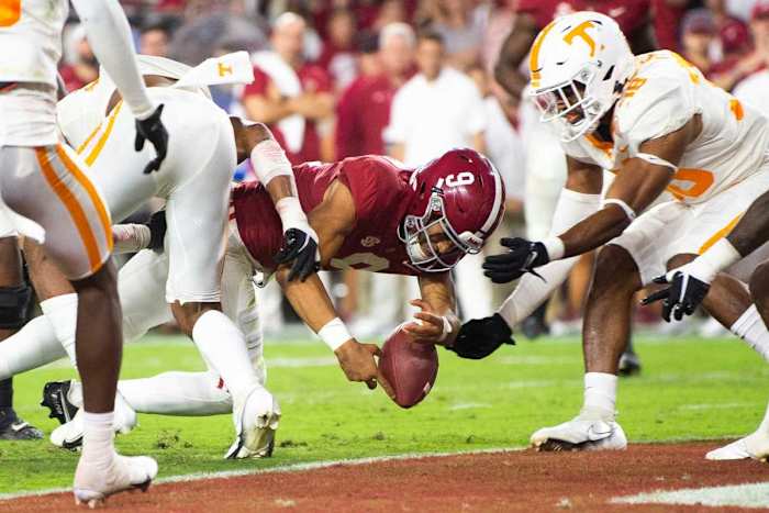 Alabama quarterback Bryce Young reaches across the goal-line but loses the ball against Tennessee