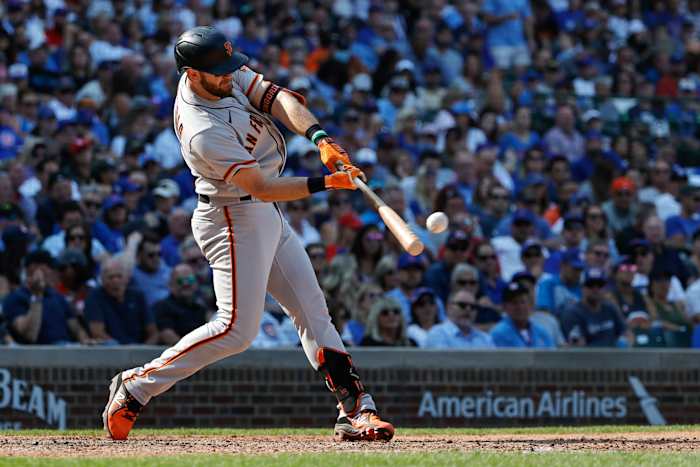 SF Giants third baseman Evan Longoria connects with a pitch against the Cubs. (2021)