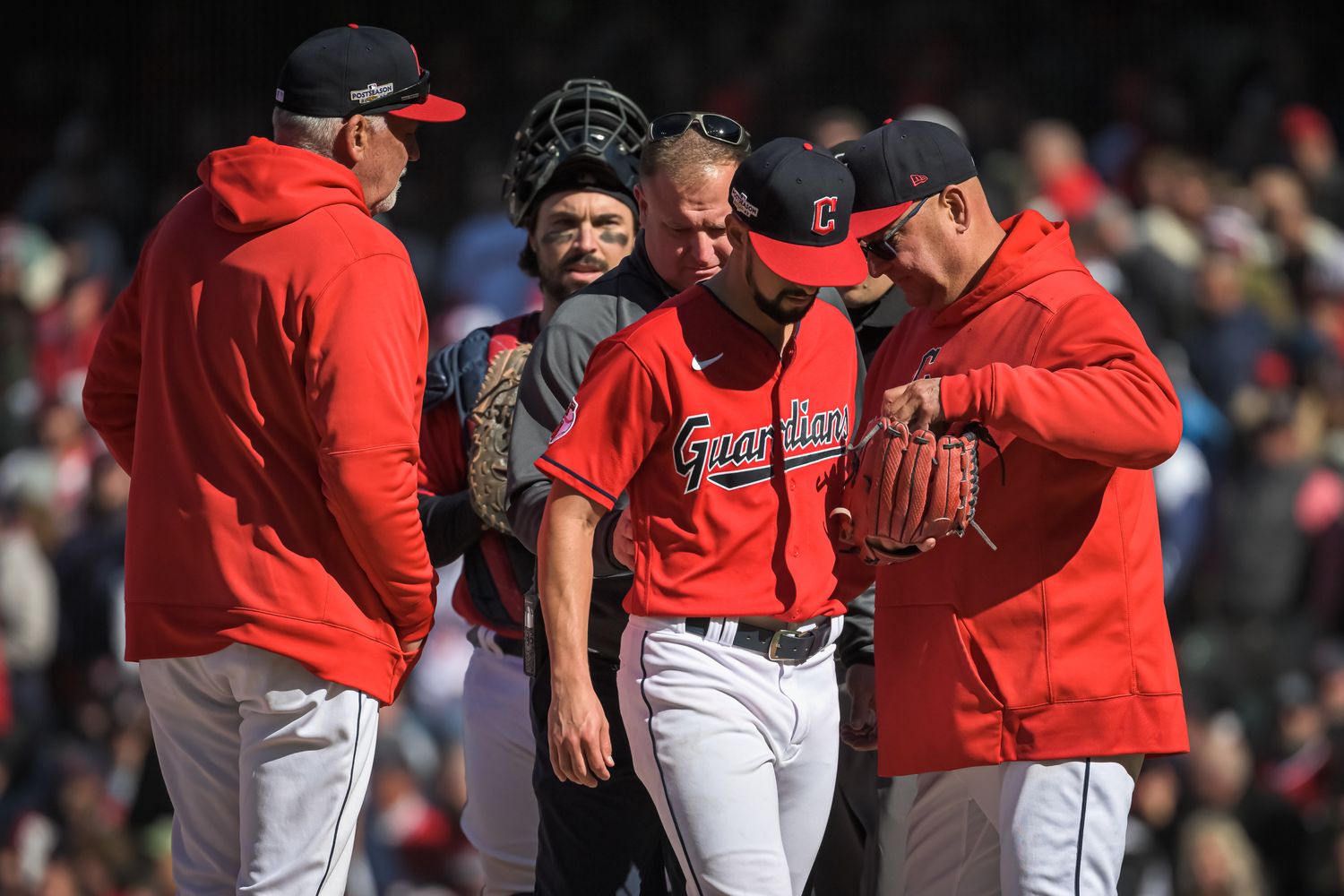 Terry Francona takes the ball from Nick Sandlin, who left Cleveland's playoff game vs. Tampa Bay with an apparent injury.