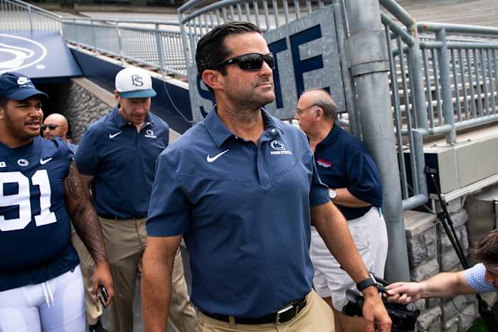 Penn State defensive coordinator Manny Diaz enters Beaver Stadium for the Nittany Lions' 2023 media day.