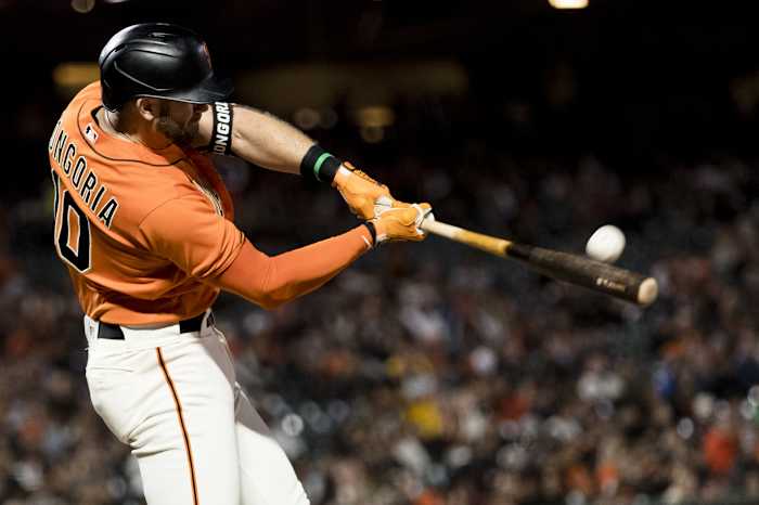 Sep 30, 2022; San Francisco, California, USA; San Francisco Giants third baseman Evan Longoria (10) hits a three-run home run against the Arizona Diamondbacks during the first inning at Oracle Park. Mandatory Credit: John Hefti-USA TODAY Sports