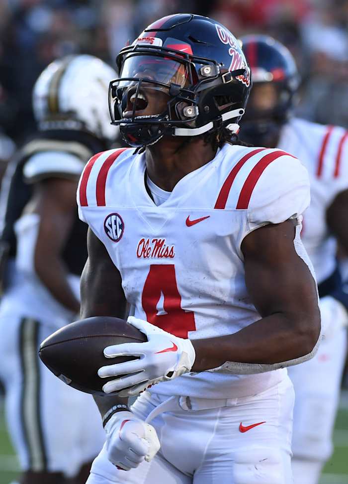 Oct 8, 2022; Nashville, Tennessee, USA; Mississippi Rebels running back Quinshon Judkins (4) celebrates after scoring against the Vanderbilt Commodores during the second half at FirstBank Stadium. Mandatory Credit: Christopher