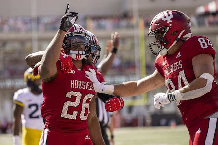 Indiana Hoosiers running back Josh Henderson (26) celebrates his touchdown during the first quarter against the Michigan Wolverines at Memorial Stadium.