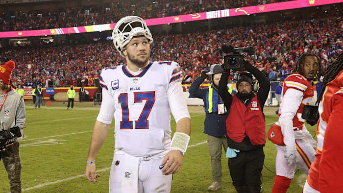 Josh Allen walks off the field after Bills' playoff loss to Chiefs