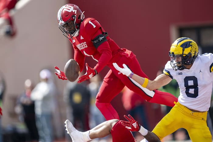 Indiana Hoosiers defensive back Devon Matthews (1) intercepts a ball meant for Michigan Wolverines wide receiver Ronnie Bell (8) in the end zone during the second half at Memorial Stadium. Wolverines won 31-10.