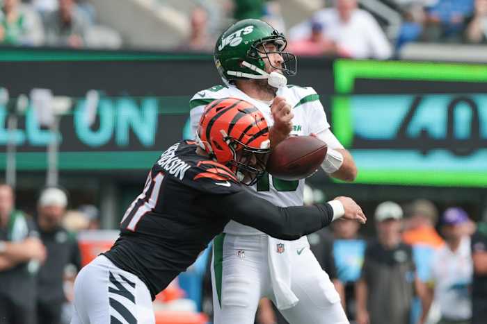 Cincinnati Bengals defensive end Trey Hendrickson (91) forces a fumble by New York Jets quarterback Joe Flacco (19). Mandatory Credit: Vincent Carchietta-USA TODAY