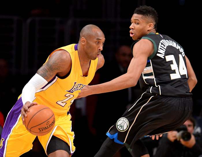 Milwaukee Bucks forward Giannis Antetokounmpo (34) defends Los Angeles Lakers forward Kobe Bryant (24)