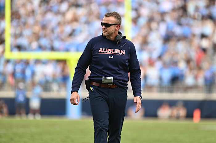 Oct 15, 2022; Oxford, Mississippi, USA; Auburn Tigers head coach Bryan Harsin walks onto the field during the second quarter of the game against the Mississippi Rebels at Vaught-Hemingway Stadium. Mandatory Credit: Matt Bush-USA TODAY Sports