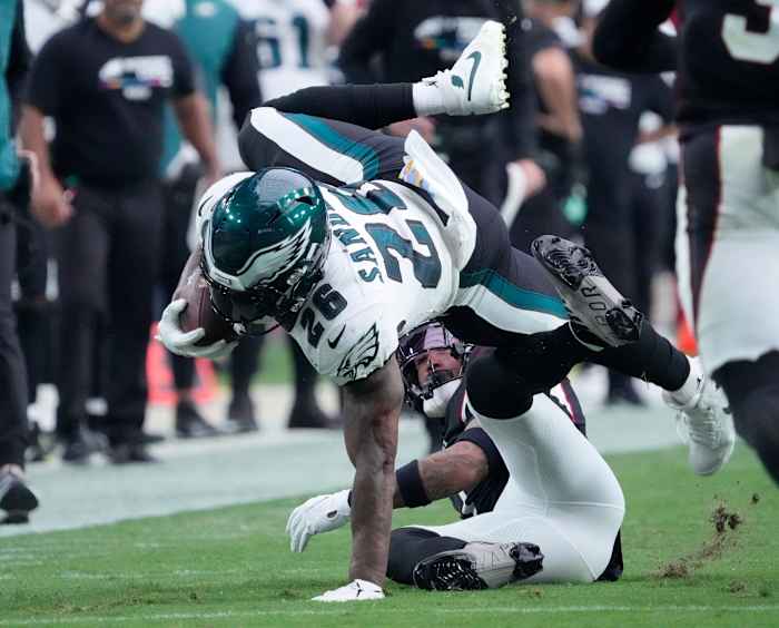 Oct 9, 2022; Glendale, Arizona, U.S.; Philadelphia Eagles running back Miles Sanders (26) is tackled by Arizona Cardinals cornerback Byron Murphy Jr. (7) after a catch during the third quarter at State Farm Stadium. Nfl Eagles
