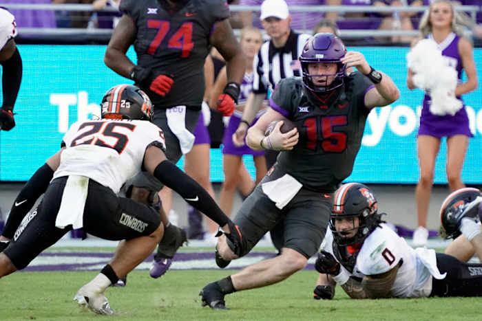 Max Duggan escapes a tackle against Oklahoma State.