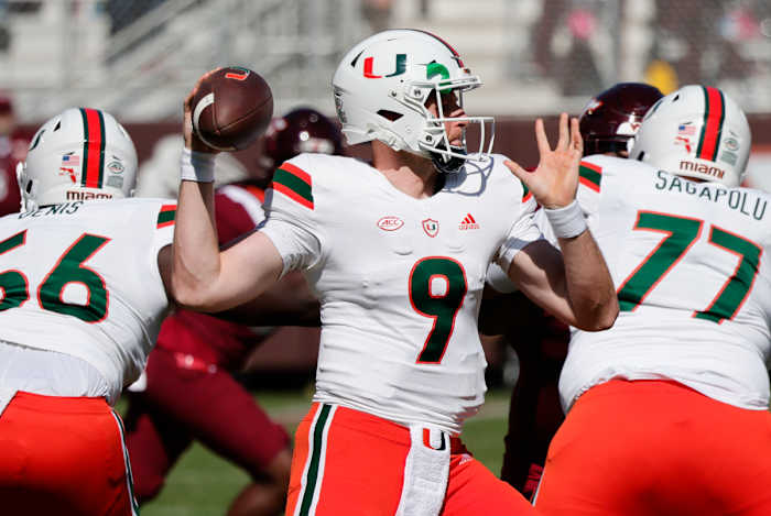 Miami QB #9 Tyler Van Dyke throws a pass Saturday vs Virginia Tech