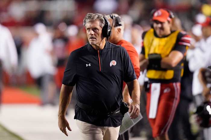 Utah coach Kyle Whittingham walks the sidelines during a game.
