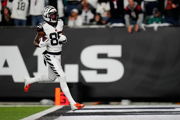Cincinnati Bengals wide receiver Tee Higgins (85) jogs into the end zone on a touchdown reception in the second quarter of the NFL Week 4 game between the Cincinnati Bengals and the Miami Dolphins at PayCor Stadium in downtown on Thursday, Sept. 29, 2022. The Bengals 14-12 at halftime. Miami Dolphins At Cincinnati Bengals Week 4