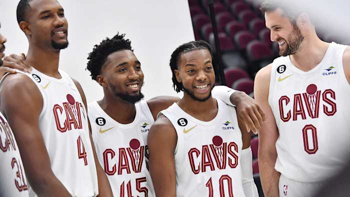 Cleveland Cavaliers center Evan Mobley (4) and guard Donovan Mitchell (45) and guard Darius Garland (10) and forward Kevin Love (0) pose for a photo during media day.