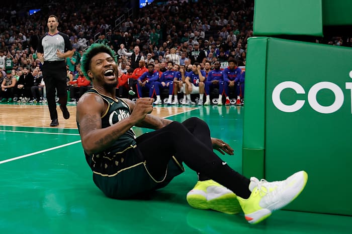 Marcus Smart smiles after being fouled.